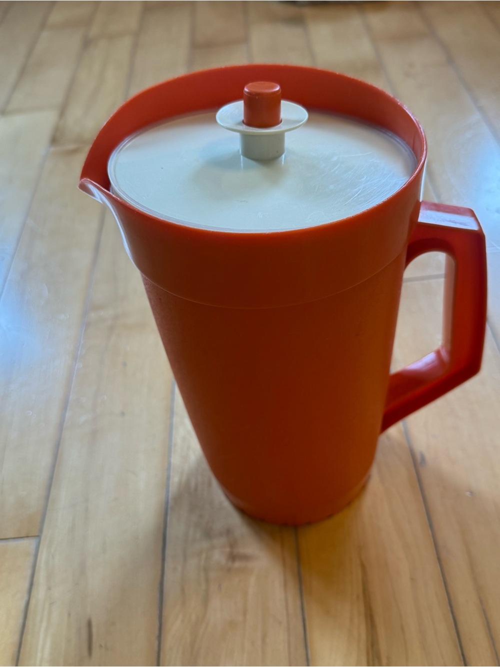Tupperware Orange Pitcher with Cream Lid and Handle